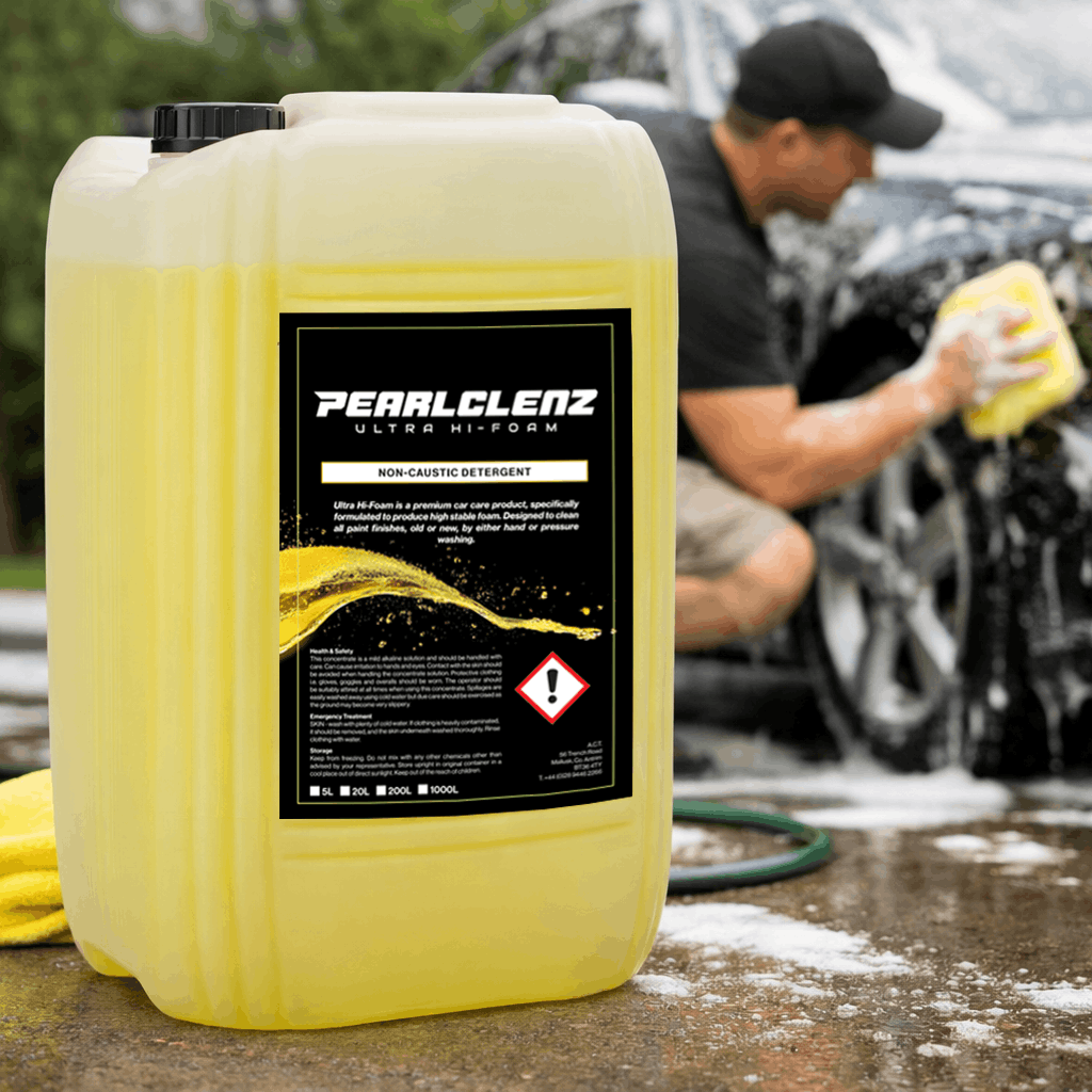Pearlclenz Ultra Hi-Form Non-Cardiac Detergent with a background of a man washing a car outdoors.