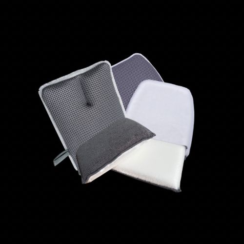 Grey and white scrubbing pad kit for car cleaning on a black background