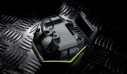 Compact Unilite HX-1080 LED detailing light with high-visibility green surround, ideal for car detailing, inspection and workshop use.