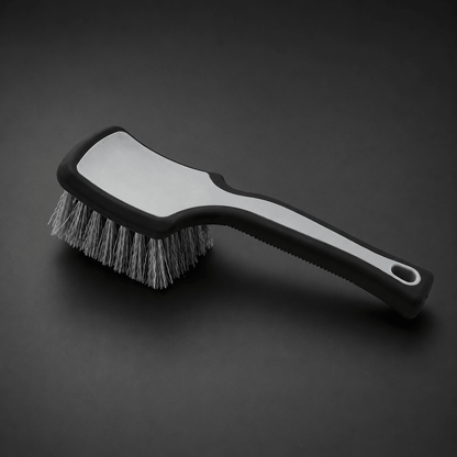 Tyre cleaning brush with a ergonomic black handle and bristle head for car cleaning and detailing