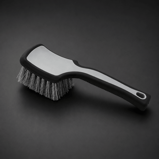 Tyre cleaning brush with a ergonomic black handle and bristle head for car cleaning and detailing