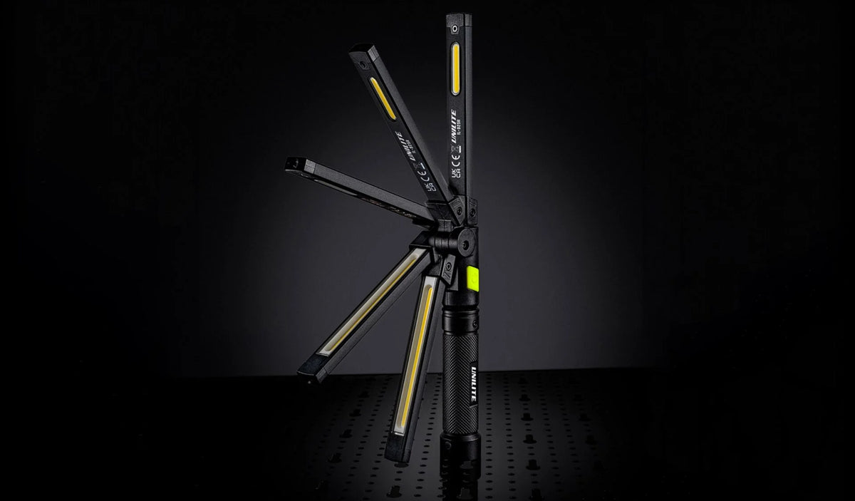 Compact Unilite folding LED inspection light for checking vehicle paintwork during polishing and car detailing.