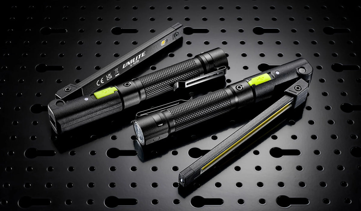 Pair of Unilite folding LED work lights for inspecting vehicle paintwork during machine polishing and car detailing.