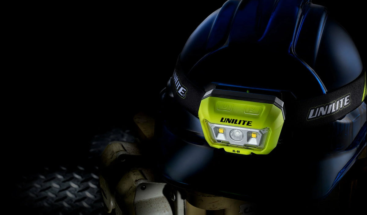 Rechargeable Unilite HL-8R work headlight for inspecting car interiors and paintwork during professional detailing.